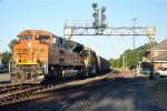 Loaded coal train rolls east